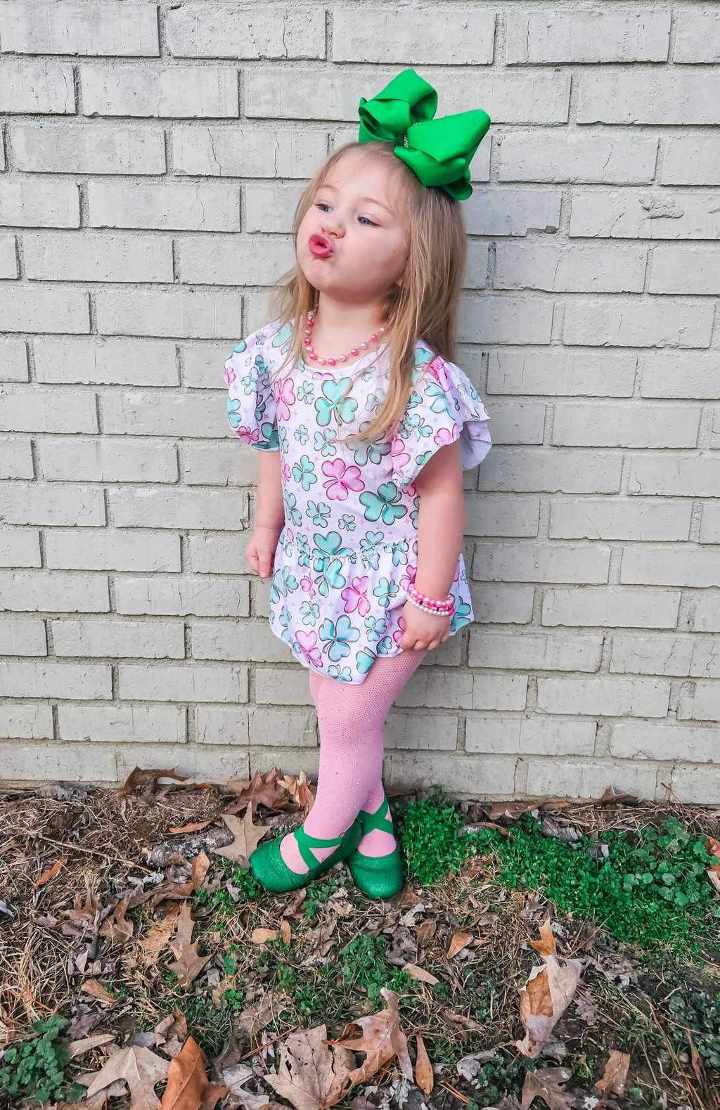 Pink clover skirted romper